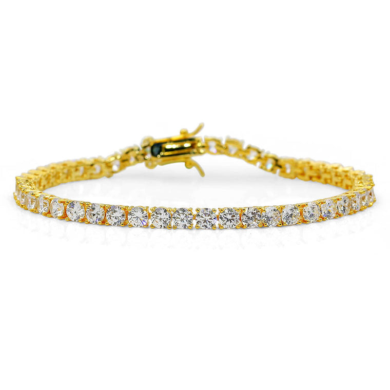Single-row tennis bracelet of round cubic zirconia in four-prong settings, shown in gold and silver