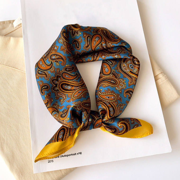 Small square neckerchief; available in six styles including paisley, bandana and near-solids with patterned corners