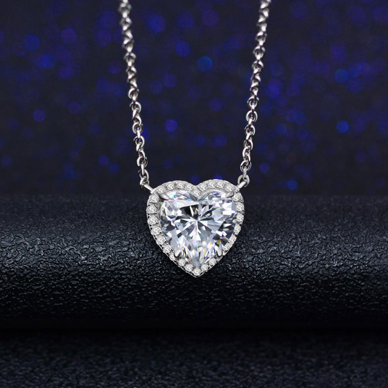 Silver-tone cable chain with a heart-cut clear stone pendant in a pavé halo