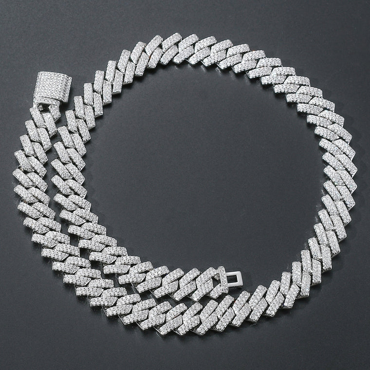 Heavy 14 mm cuban link chain fully iced with micro-set cubic zirconia, shown as a necklace and a bracelet in gold and in silver