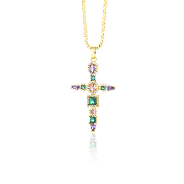 Four dainty gold-tone cross necklaces: thin minimal cross, heart-link cross, petal-point cross, and a colored-stone cross