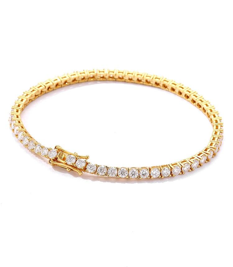 Tennis bracelet fully lined with round moissanite stones in a four-prong setting, shown in white, yellow and rose gold tones