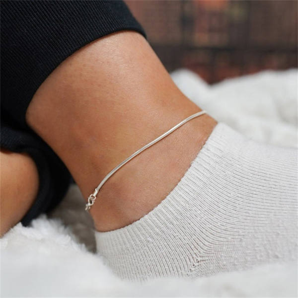 Thin liquid-look herringbone chain anklet, shown in gold-tone and silver-tone