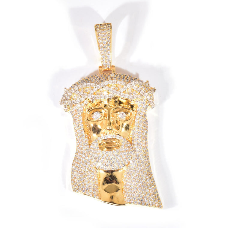 Iced Jesus head pendant, hair, beard and crown of thorns set in cubic zirconia, in gold, on white